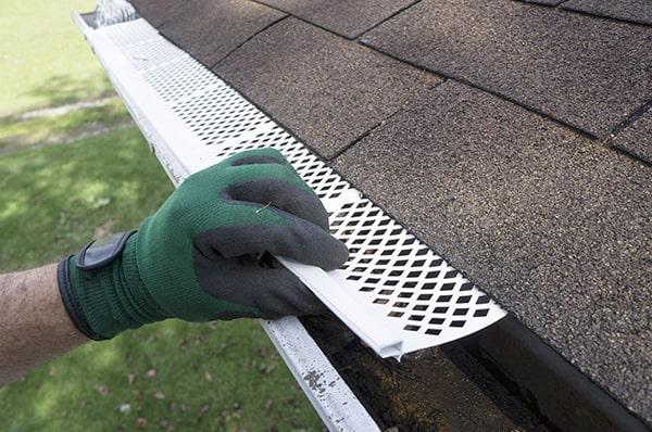 gutter guards help prevent clogs, protect against pests, and require less maintenance